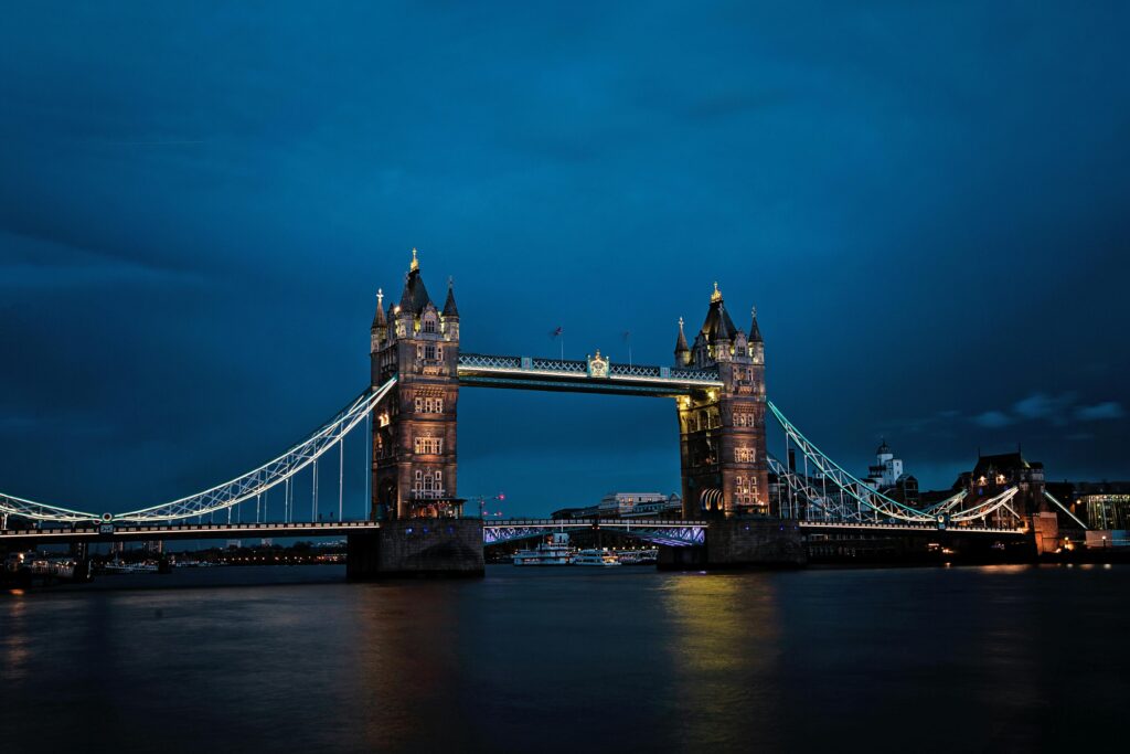 pexels-photo-427679-427679 A stunning view of the illuminated Tower Bridge in London against a deep blue night sky.